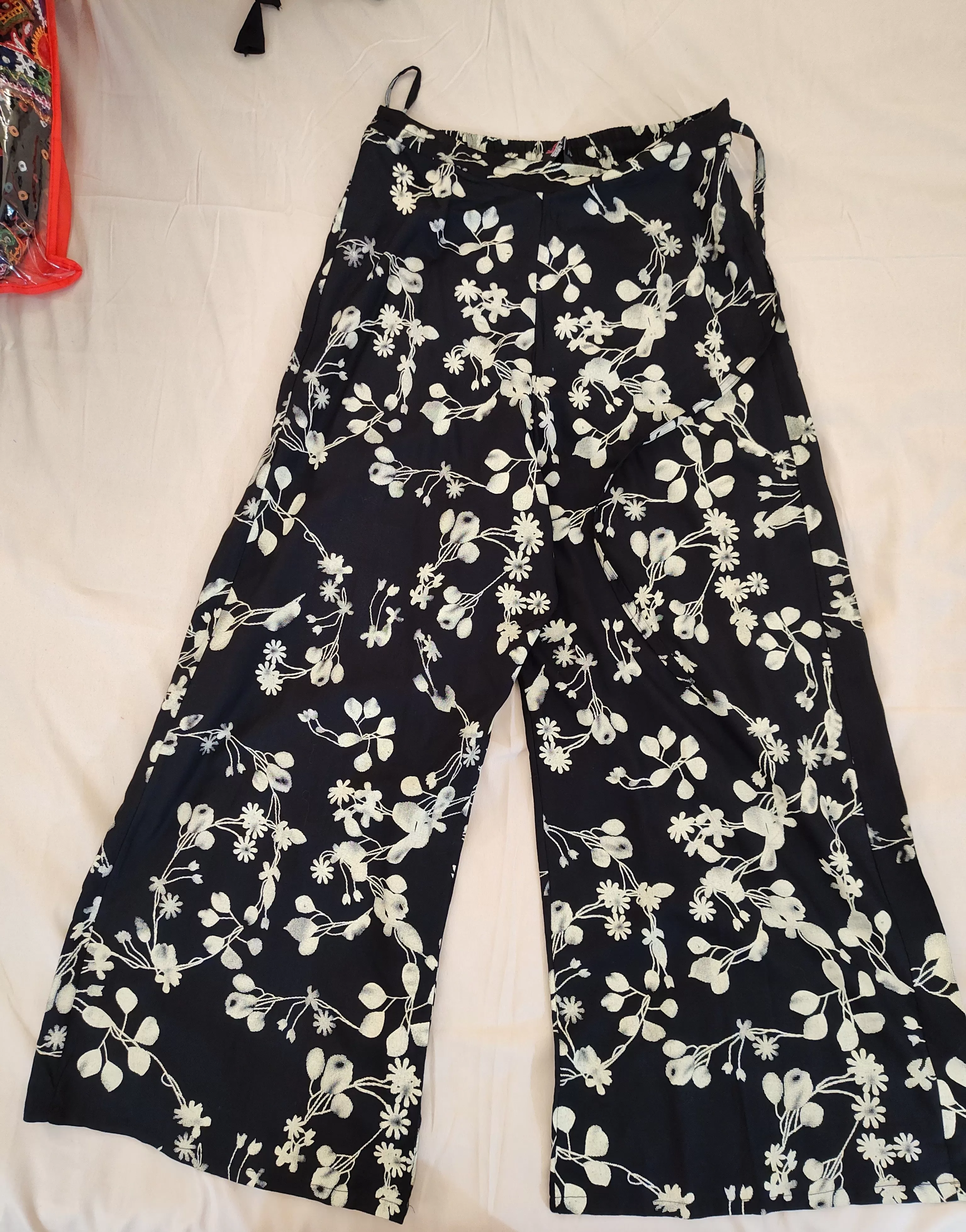 Beautiful Black Palazzo Pants With Beige Floral Design